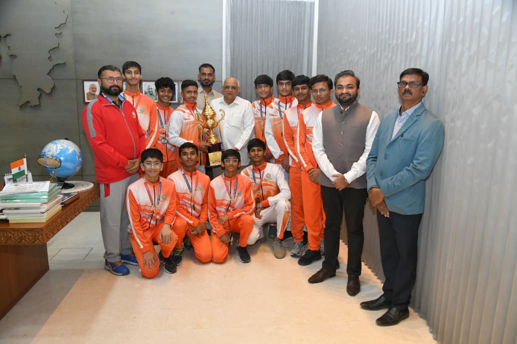 Madhav International School team with trophy