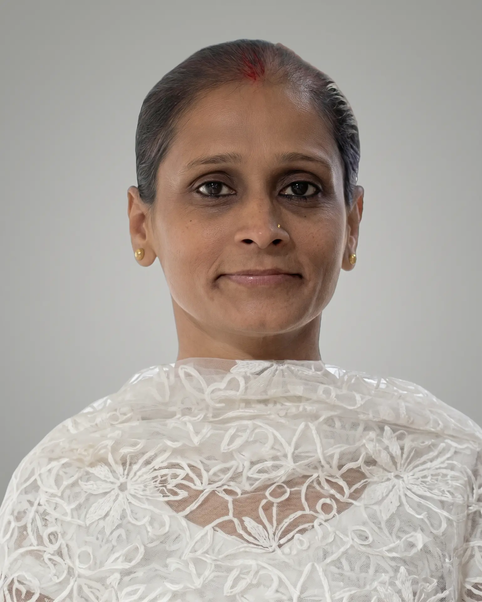 Mrs. Ratna Kaur Saini
